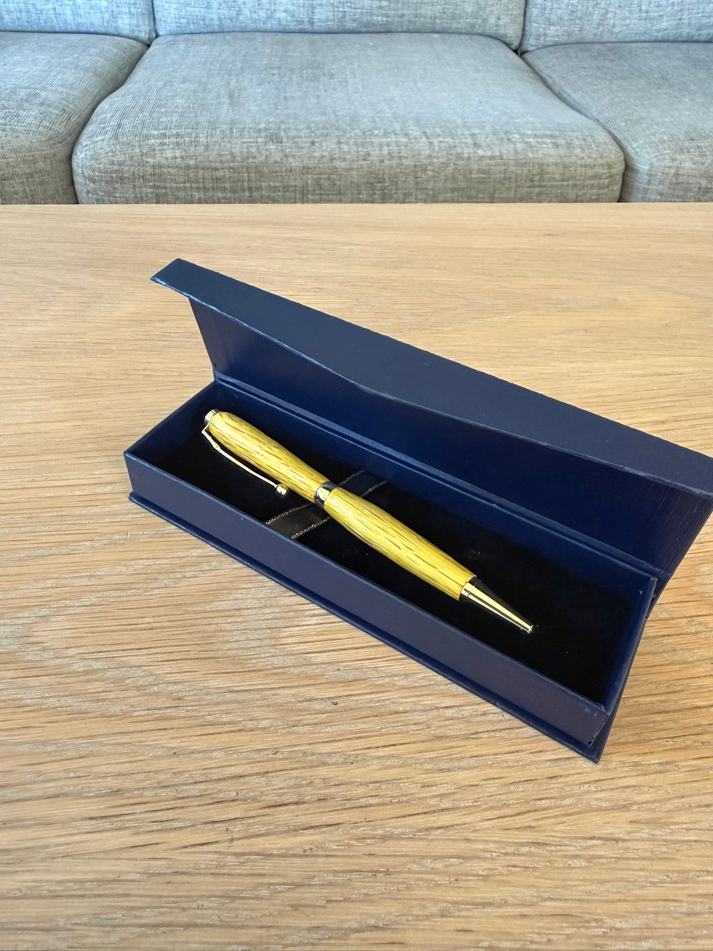 Hand-turned colored oak pen with 24k gold plating